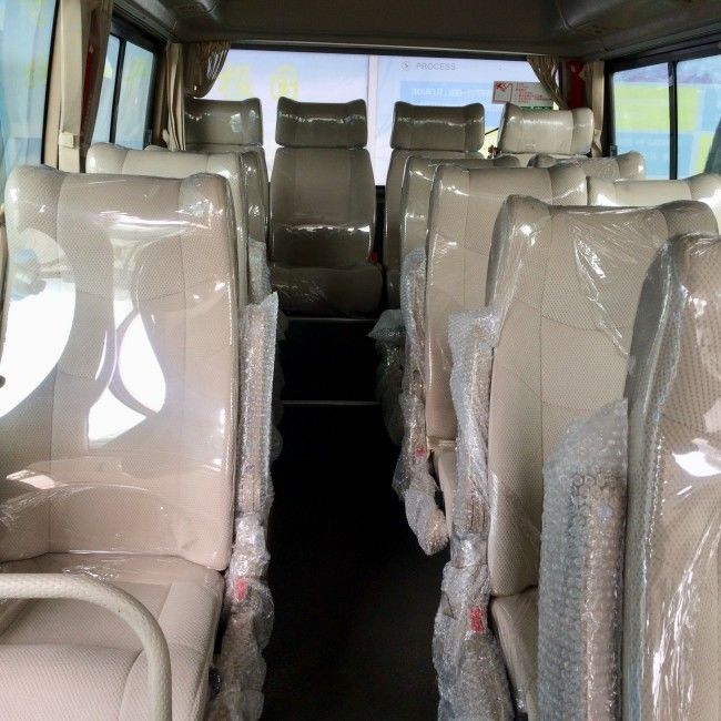 सार्वजनिक परिवहन के लिए 7 मीटर डीजल कोस्टर बस 25 सीटें मैनुअल 5 गियर